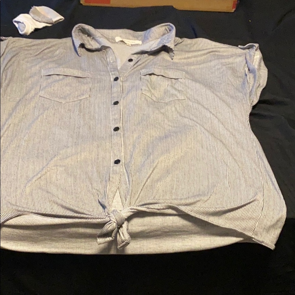 Striped gray. Button down with tie at bottom